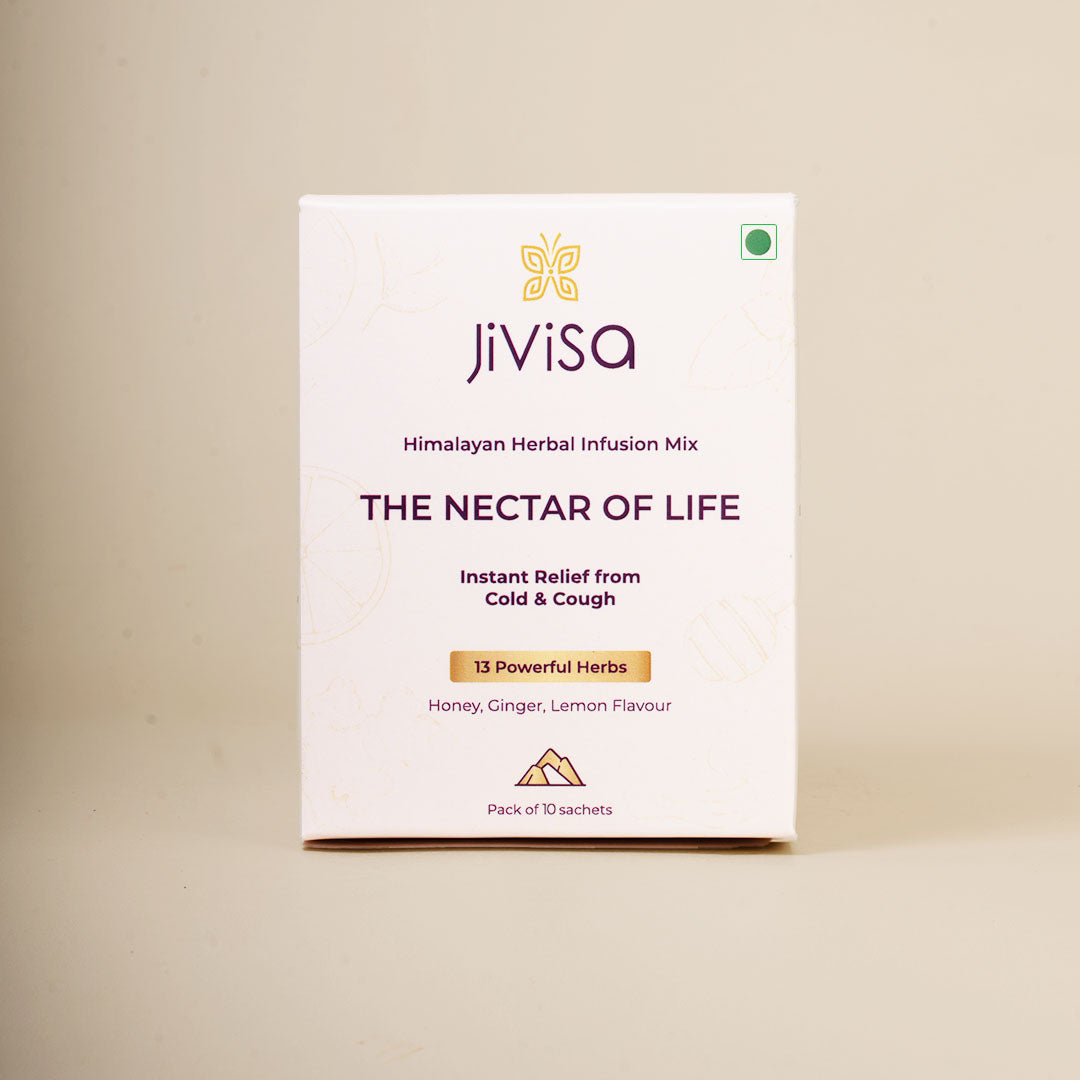 JiViSa The Nectar of Life Himalayan Herbal Infusion Mix box โ an Ayurvedic blend offering instant relief from cold and cough. The packaging highlights 13 powerful herbs with honey, ginger, and lemon flavour, available in a pack of 10 sachets. This natural infusion supports immunity, soothes the throat, and promotes overall wellness.