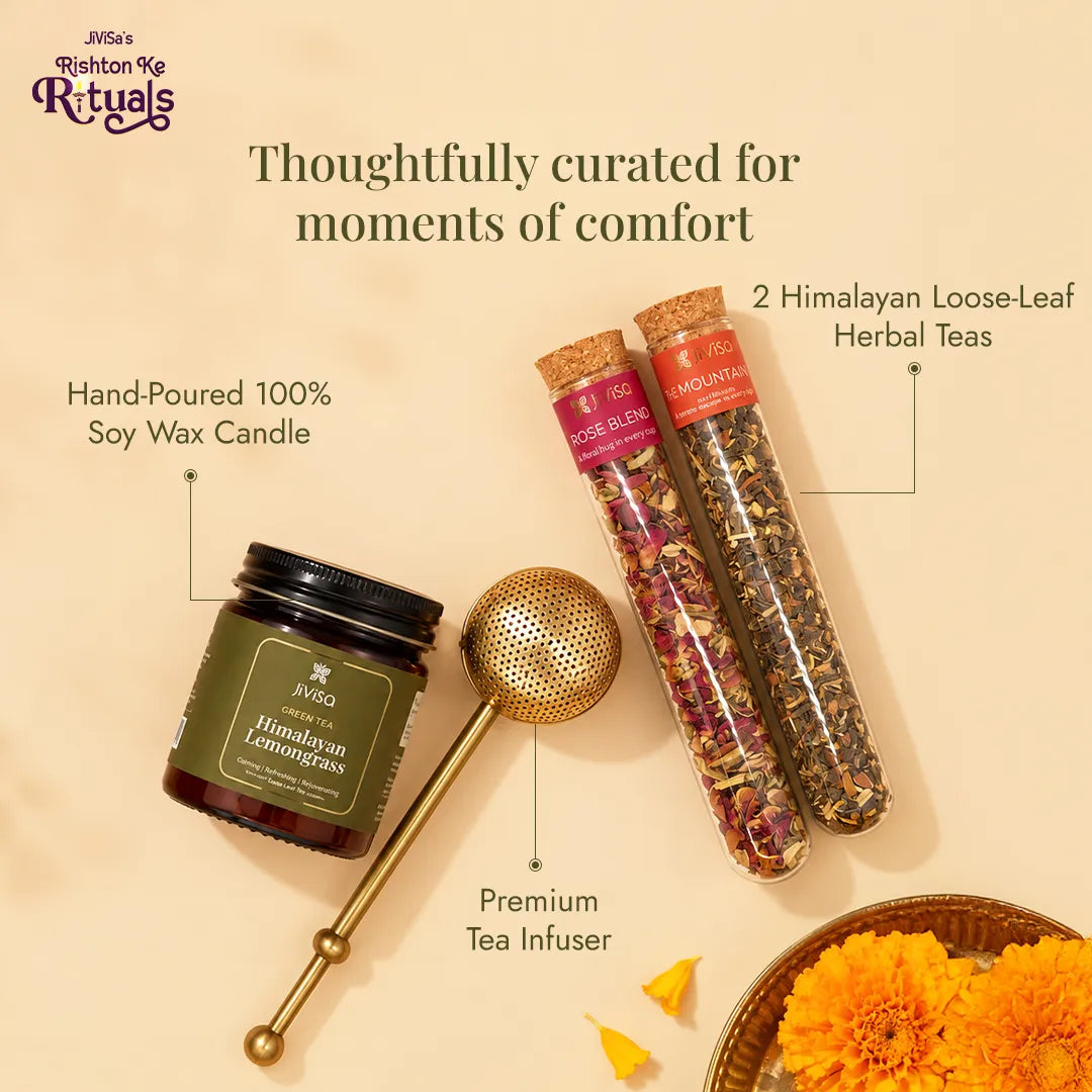 Contents of the JiViSa Brew_n_Bliss gift box labelled: hand-poured soy wax candle, premium tea infuser and two Himalayan loose-leaf herbal teas