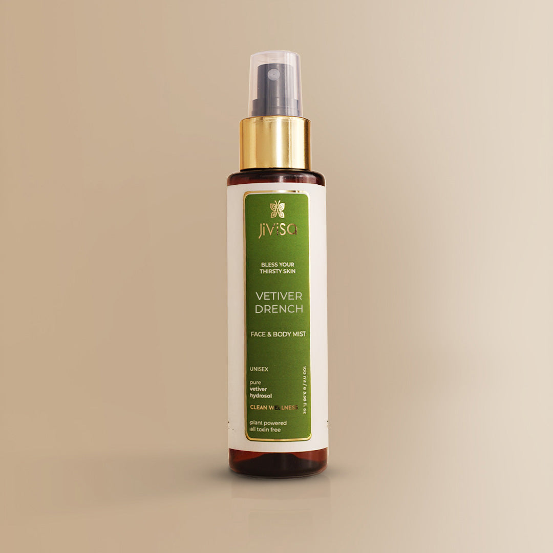 JiViSa Vetiver Drench face and body mist bottle on a beige background