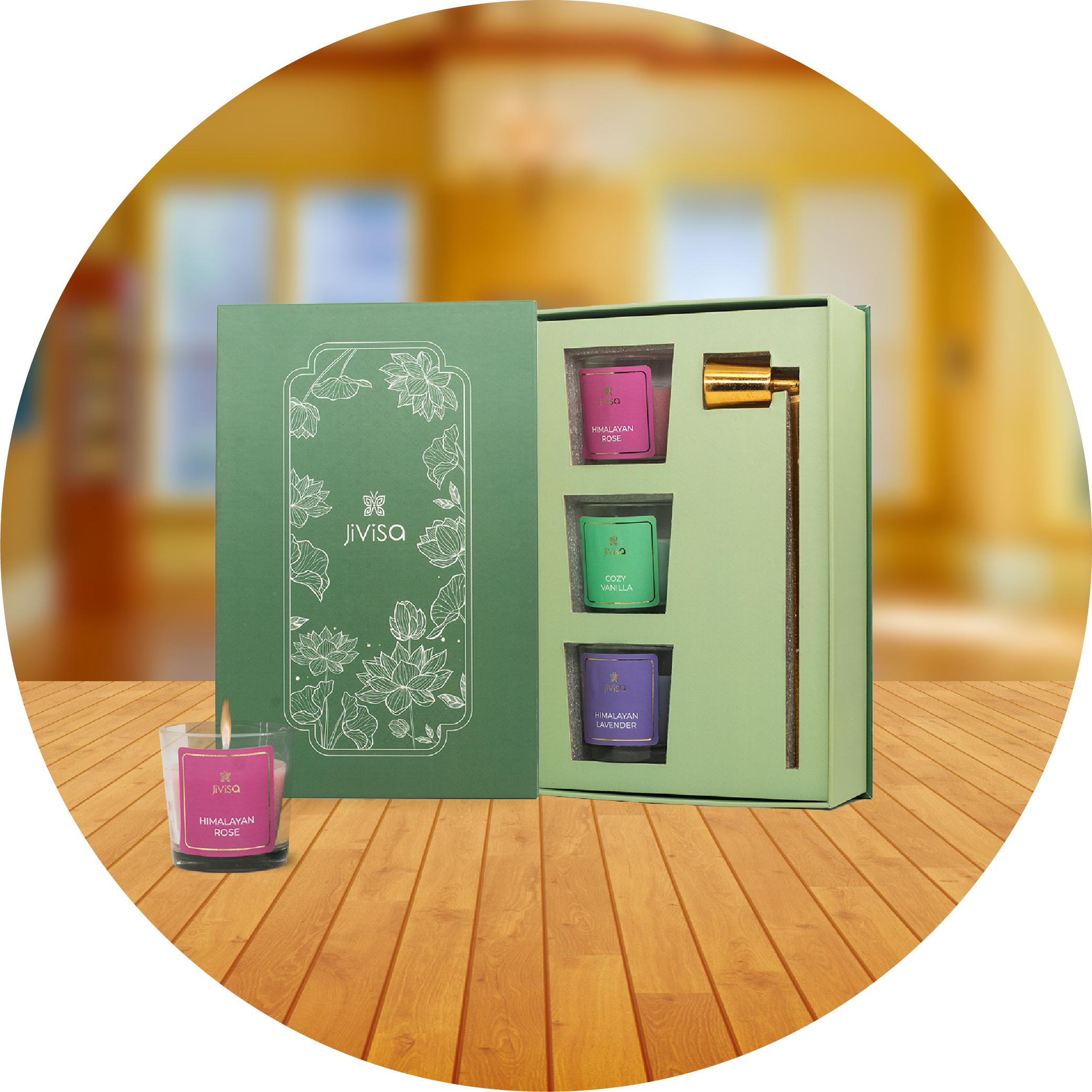 JiViSa candle set with green packaging contains 3 votive candles and a brass snuffer on a wooden surface. It is for House Warming collection