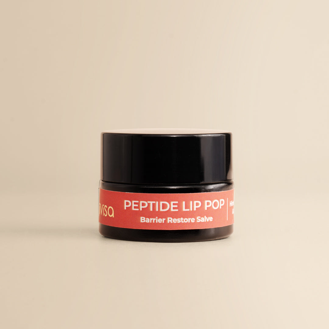 JiViSa Peptide Lip Pop Salve Himalayan Rose & Lavender Barrier Restore Salve jar on beige background.