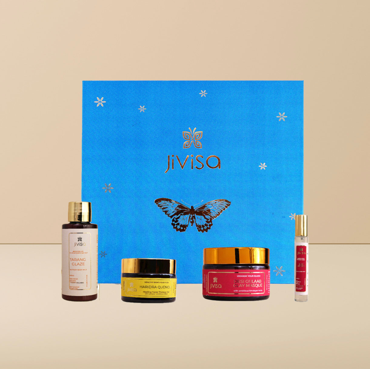 JiViSa Self-Care Bloom Gift Box with body milk, aloe gel, rose clay mask, and face mist in a luxury blue butterfly box.