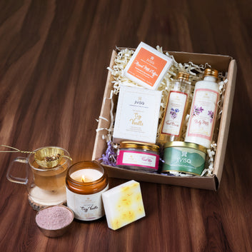 JiViSa Luxury Tea, Ubtan, Glass Candle, Facial Cleanser, Bodymilk, Soap & Spoon Gift Box (With Handmade Rakhi)