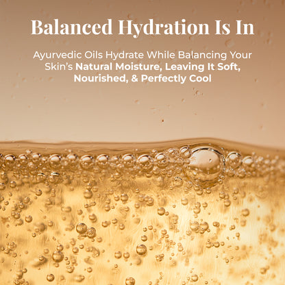Close-up abstract image of golden-hued liquid with numerous small and large bubbles, suggesting a rich, bubbly texture. Tagline: Balanced Hydration Is In. Text describes the benefits of JiViSa Seven Spice Ayurvedic soap ingredients: Ayurvedic Oils Hydrate While Balancing Your Skin’s Natural Moisture, Leaving It Soft, Nourished, &amp; Perfectly Cool.