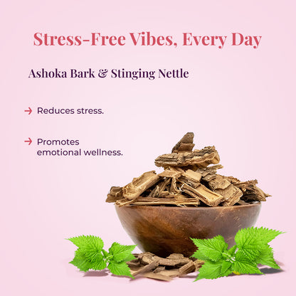 A wooden bowl filled with Ashoka bark and fresh Stinging Nettle leaves placed beside it. The tagline reads: &quot;Stress-Free Vibes, Every Day.&quot; Beneath it, the text says: &quot;Ashoka Bark &amp; Stinging Nettle.&quot; The benefits listed are: Reduces stress and Promotes emotional wellness.