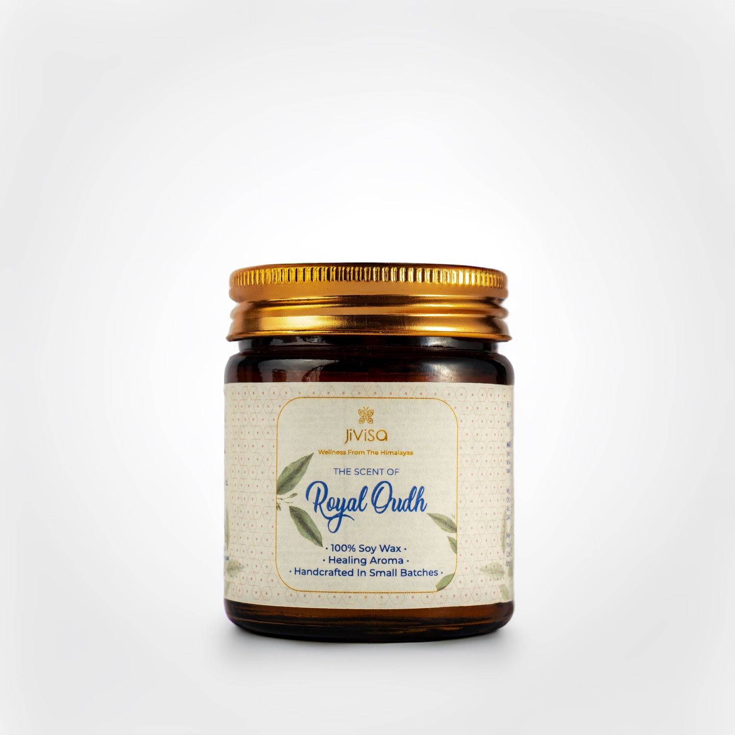 JiViSa Royal Oudh Handcrafted Soy Wax Candle 90gm in an amber glass jar with a Golden tin and white label.  The label reads: &quot;JiViSa Wellness From The Himalayas, THE SCENT OF Royal Oudh, 100% Soy Wax Candle, Healing Aroma, Handcrafted in Small Batches&quot;.