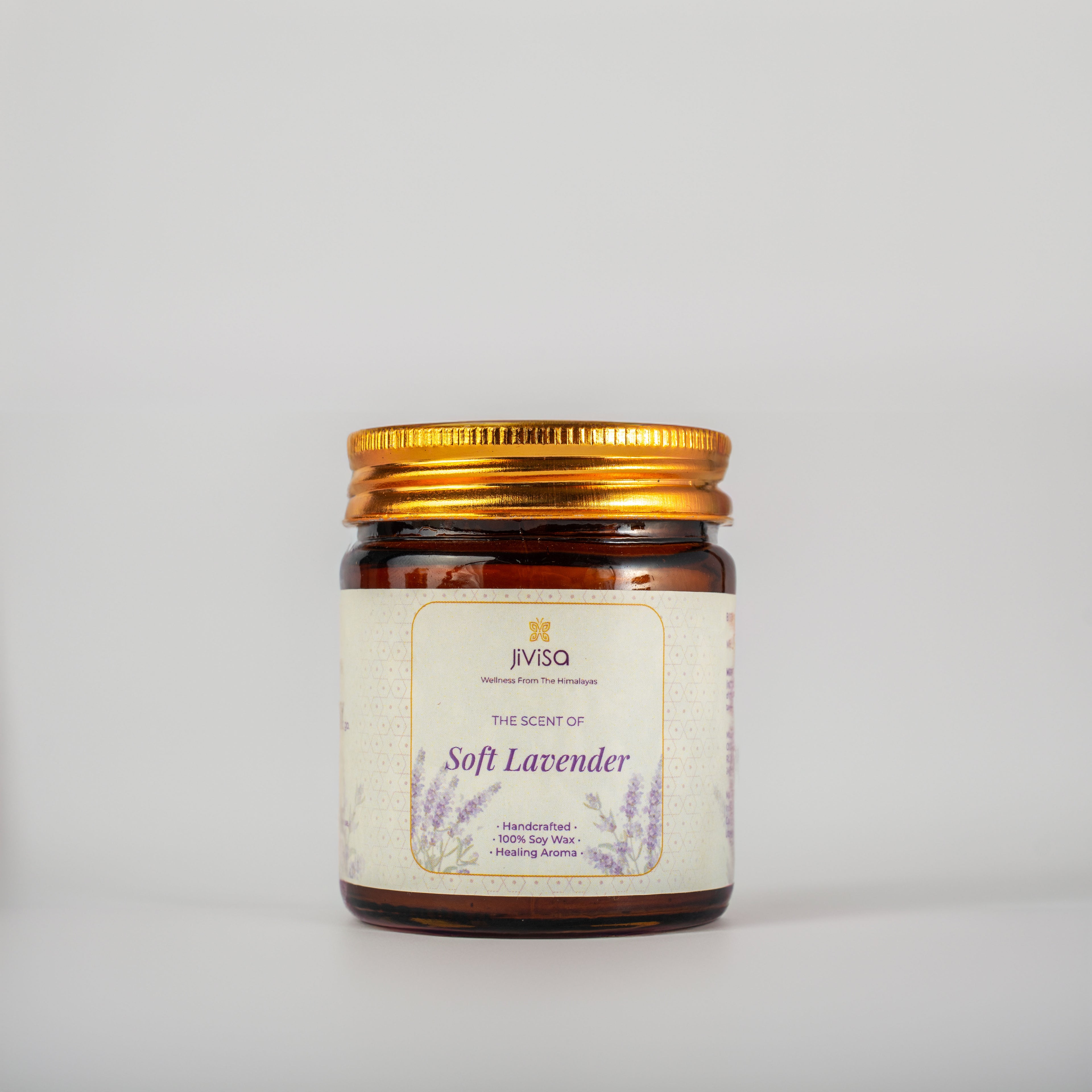 JiViSa Soft Lavender Handcrafted Soy Wax Candle 90gm in an amber glass jar with a Golden tin and white label.  The label reads: &quot;JiViSa Wellness From The Himalayas, THE SCENT OF Soft Lavender, Handcrafted 100% Soy Wax Candle, Healing Aroma&quot;.