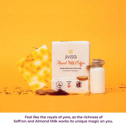 JiViSa Almond Milk and Saffron soap bar with almonds, saffron threads, and milk bottle on yellow background celebrating royal skincare tradition