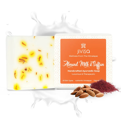 JiViSa Almond Milk and Saffron Ayurvedic soap bar with milk splash, almonds, and saffron threads on white background