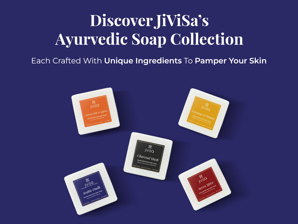 Tagline reads: “Discover JiViSa’s Ayurvedic Soap Collection.” Subtext below says: Each Crafted with Unique Ingredients to Pamper your skin. Five JiViSa handmade ayurvedic soap variants are displayed: Almond Milk & Saffron, Coconut & Honey, Charcoal Musk, Sweet Spice, and Arabic Oudh, arranged diagonally on a rich blue background.