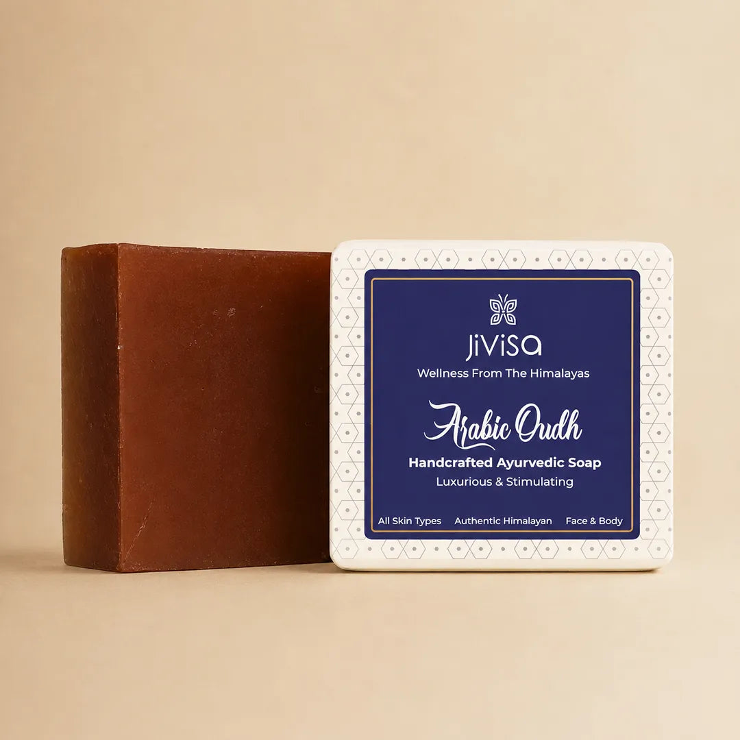 JiViSa Arabic Oudh Handcrafted Ayurvedic Soap bar standing beside its brown soap bar on beige background