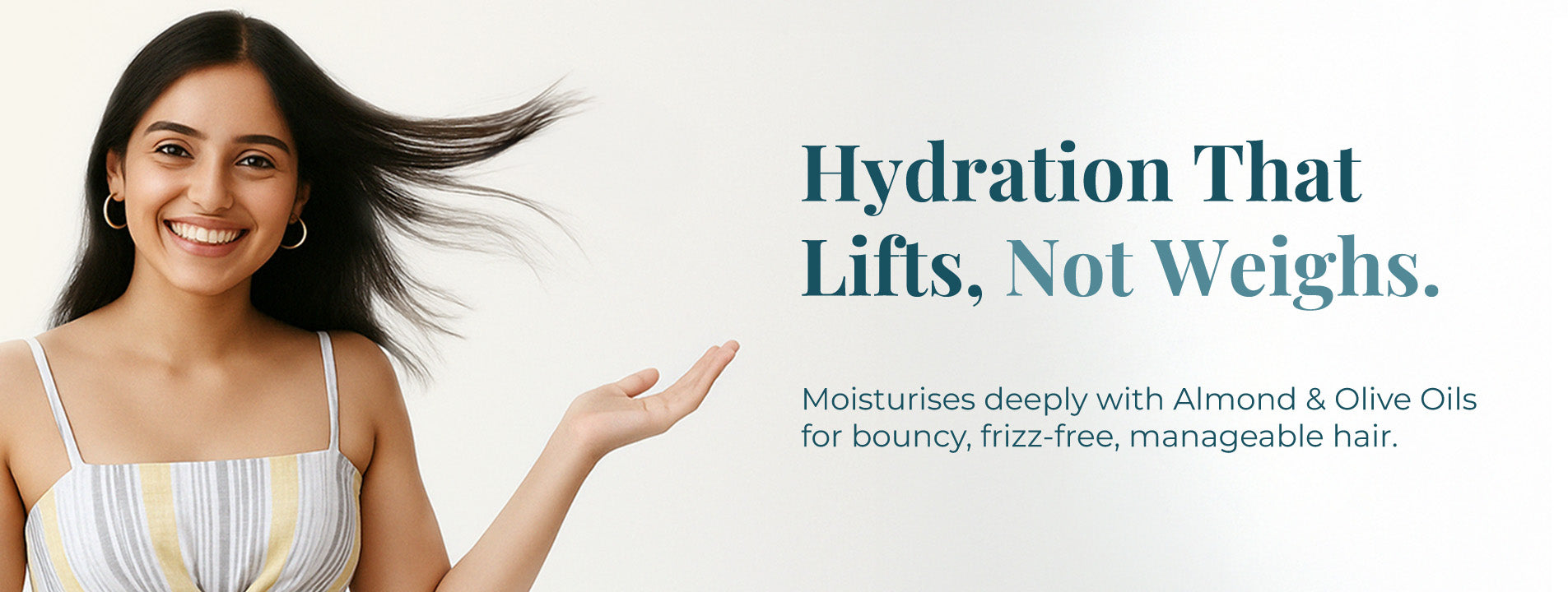 Image features a smiling woman with vibrant, dark hair, representing the positive effects of the JiViSa Aranya Lustre Hair conditioner. The visual of hair flowing upwards reinforces the idea of "Hydration That Lifts, Not Weighs." The accompanying text clearly highlights the key benefits of the product – Moisturises deeply with Almond & Olive Oils for bouncy, frizz-free, and manageable hair
