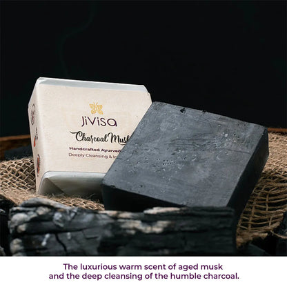 JiViSa Charcoal Musk soap bar on burlap with charcoal pieces, showing deep cleansing and warm musk scent