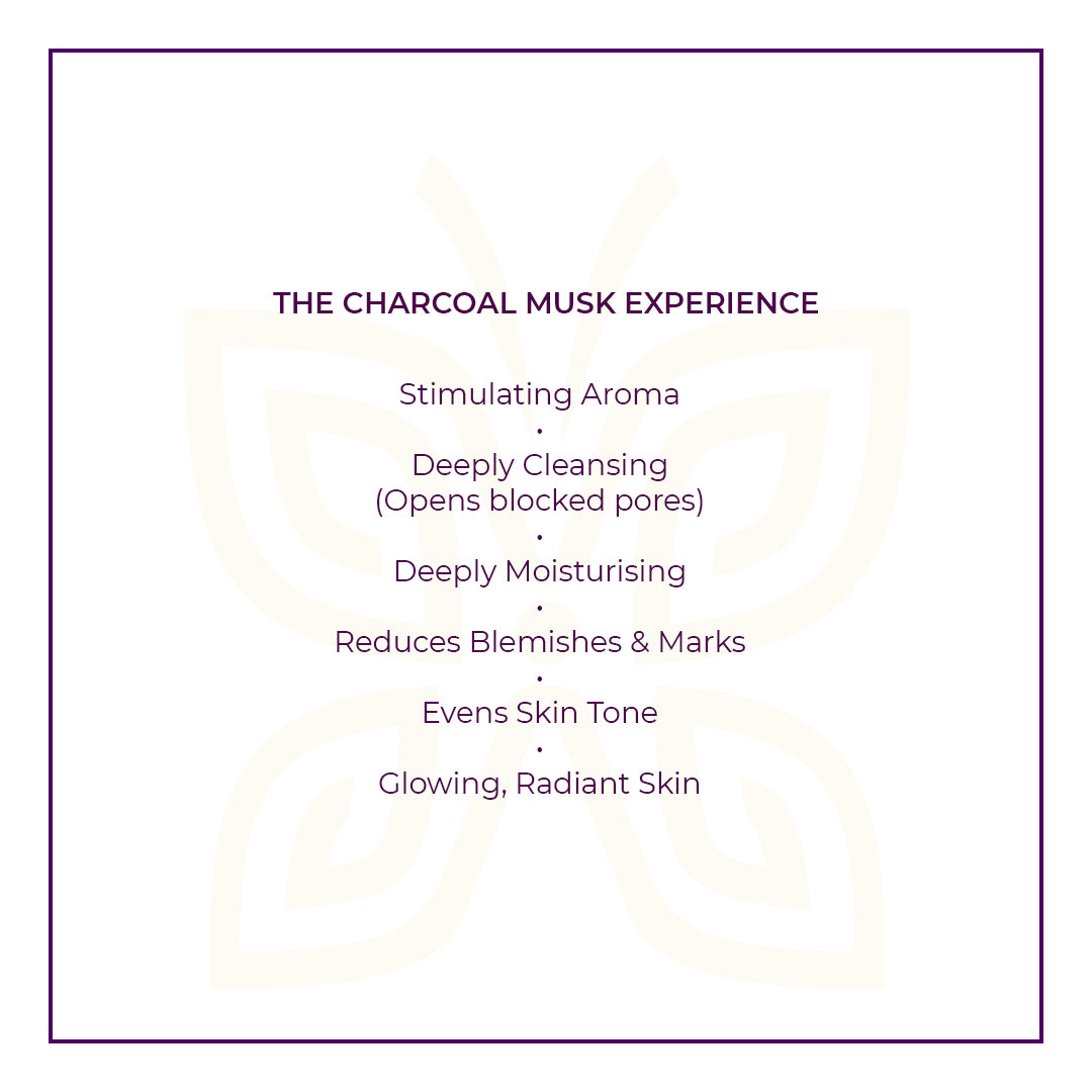 Text on a white background within a purple border describe JiViSa charcoal Musk ayurvedic Soap Benefits. Headline: THE CHARCOAL MUSK EXPERIENCE. Listed benefits: Stimulating Aroma | Deeply Cleansing (Opens blocked pores) | Deeply Moisturising | Reduces Blemishes &amp; Marks | Evens Skin Tone | Glowing, Radiant Skin.