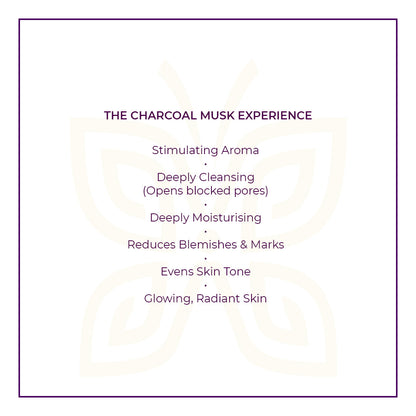Text on a white background within a purple border describe JiViSa charcoal Musk ayurvedic Soap Benefits. Headline: THE CHARCOAL MUSK EXPERIENCE. Listed benefits: Stimulating Aroma | Deeply Cleansing (Opens blocked pores) | Deeply Moisturising | Reduces Blemishes &amp; Marks | Evens Skin Tone | Glowing, Radiant Skin.