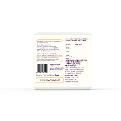 Back view of JiViSa Coconut &amp; Honey Ayurvedic Handmade Soap packaging showing the full label. The ingredient section lists: Coconut Oil (0.4%), Aloe Vera (0.3%), Castor Oil (0.3%), Olive Oil (0.3%), Almond Oil (0.1%), and Honey (0.1%). The soap base is made from coconut oil, essential oils, permitted natural aroma, and contains no added colors. It is marked &quot;For External Use Only&quot; and features a barcode along with the AYUSH license number (ML No. 82/ISM). 