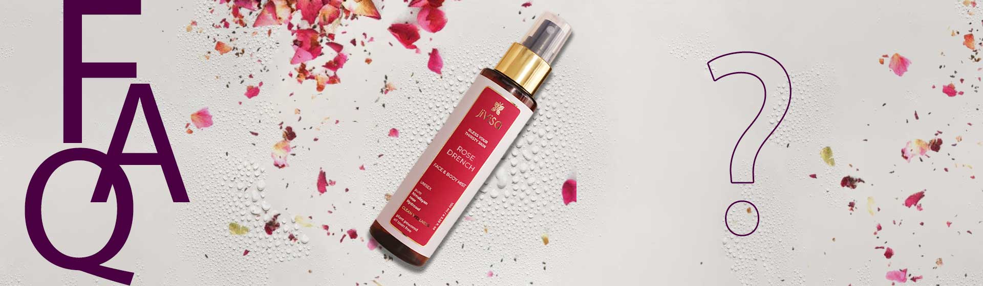 FAQ graphic for JiViSa Rose Drench Face & Body Mist – brown spray bottle with gold cap and red label placed on dewy water droplets with rose petals around it, framed by large purple "FAQ" text and a purple question mark on the right.