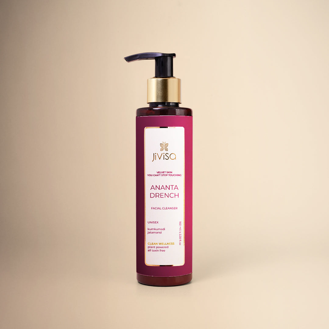JiViSa Ananta Drench Facial Cleanser in a pump bottle with a gold dispenser. 
