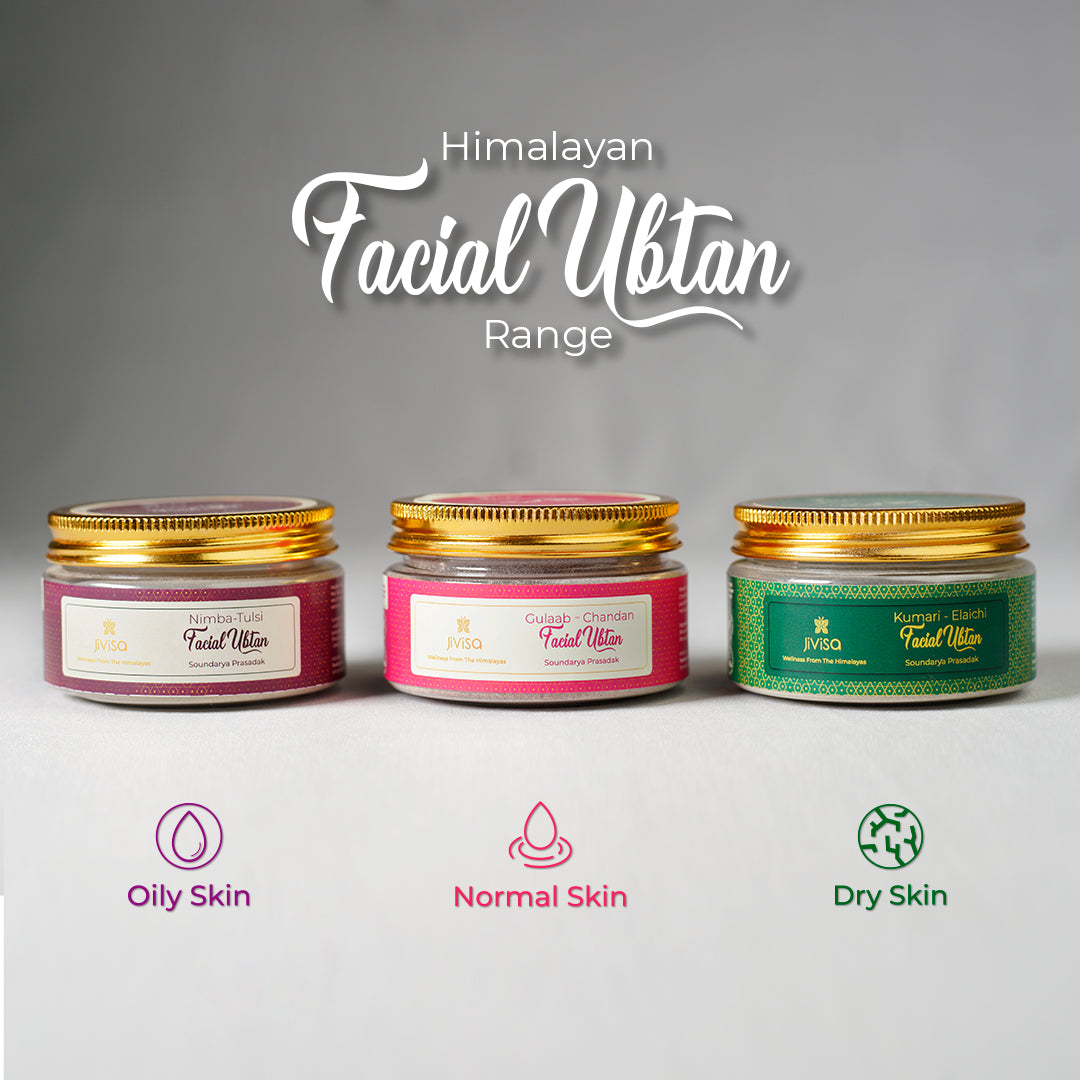 Three jars of JiViSa Himalayan Facial Ubtan are displayed against a muted green background. The jar on the left has a pink label, with text indicating it&