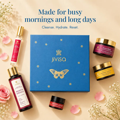 JiViSa Himalayan Self-Care Rituals Gift Box with a blue gift box surrounded by Ananta Drench Cleanser, Rose Drench Mist, Kesara Illume Cream, Haridra Quench Aloe Gel, and Peptide Lip Pop Lip Balm.