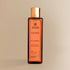 JiViSa Khubani Apricot Kernel Oil 200ML bottle with gold cap on beige background.