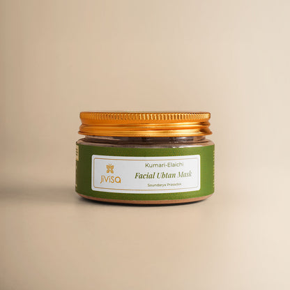JiViSa Kumari-Elaichi Facial Ubtan Mask jar with a green label and golden lid. An Ayurvedic D.I.Y. face pack for deep hydration formulated with Aloe Vera, Cardamom, White Sandalwood, Fuller’s Earth, and Yeast Extract. This toxin-free blend gently cleanses, soothes, and revitalizes the skin, leaving it soft, smooth, and naturally radiant.