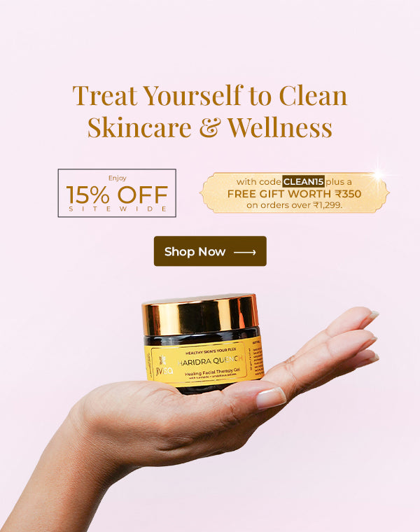 JiViSa Haridra Quench Healing Facial Therapy Gel held gracefully in hand against a soft pink background. The banner reads “Treat Yourself to Clean Skincare & Wellness,” offering 15% OFF sitewide with code CLEAN15 and a free gift worth ₹350 on orders above ₹1,299. A “Shop Now” button encourages customers to explore JiViSa’s clean beauty range.