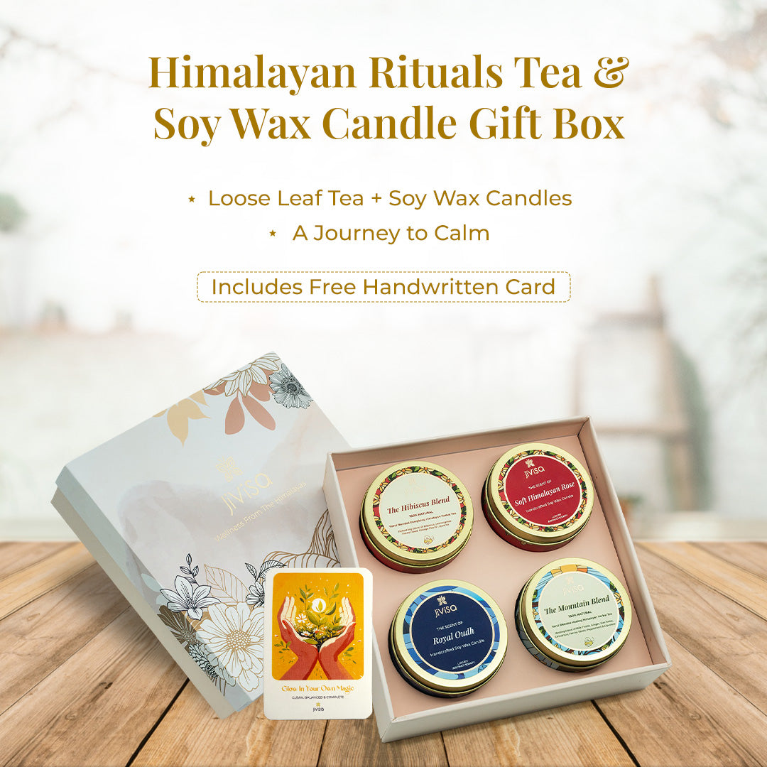 Tagline reads: "Himalayan Rituals Tea &amp; Soy Wax Candle Gift Box – Loose Leaf Tea + Soy Wax Candles. A Journey to Calm. Includes Free Handwritten Card" followed by a beautifully styled product showing JiViSa’s premium gift box open to reveal two Ayurvedic loose leaf teas (The Hibiscus Blend and The Mountain Blend) and two handcrafted soy wax candles (Soft Himalayan Rose and Royal Oudh). A bright illustrated handwritten gift card placed alongside adds a personal, heartfelt touch.