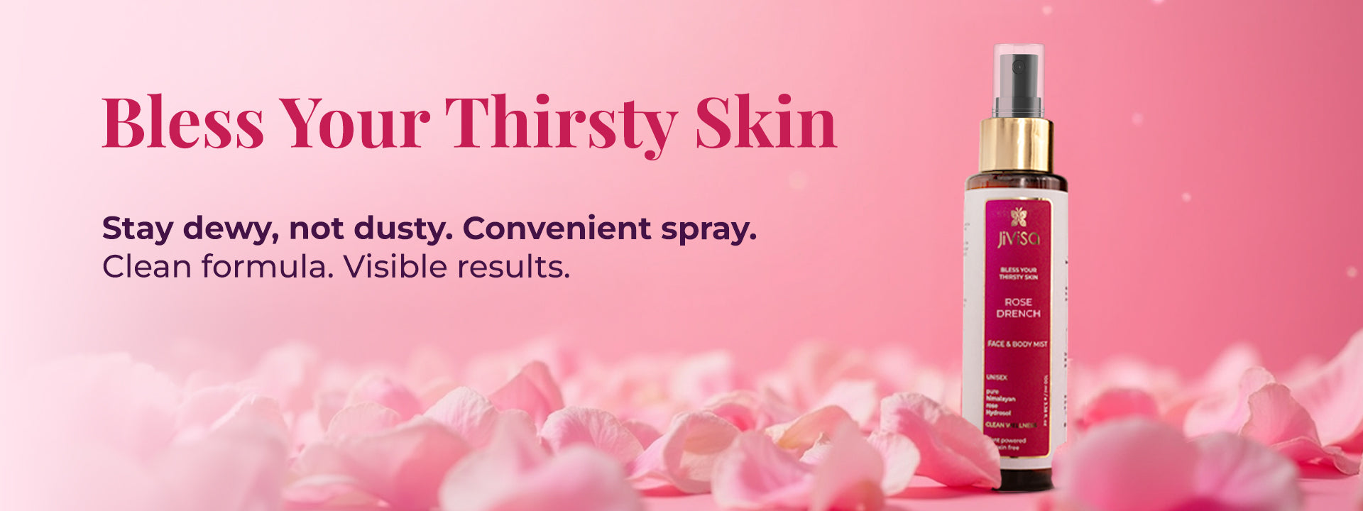 Rose Drench Face & Body Mist bottle on a soft pink background with rose petals, highlighting hydrating spray skincare for dewy, refreshed skin.