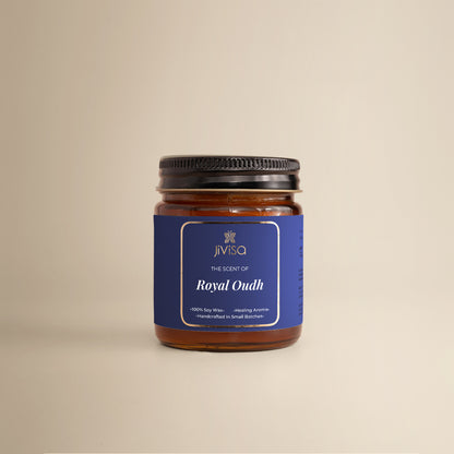 JiViSa Royal Oudh Handcrafted Soy Wax Candle 90gm in an amber glass jar with a Black tin and blue label.  The label reads: &quot;JiViSa Wellness From The Himalayas, THE SCENT OF Royal Oudh, 100% Soy Wax Candle, Healing Aroma, Handcrafted in Small Batches&quot;.