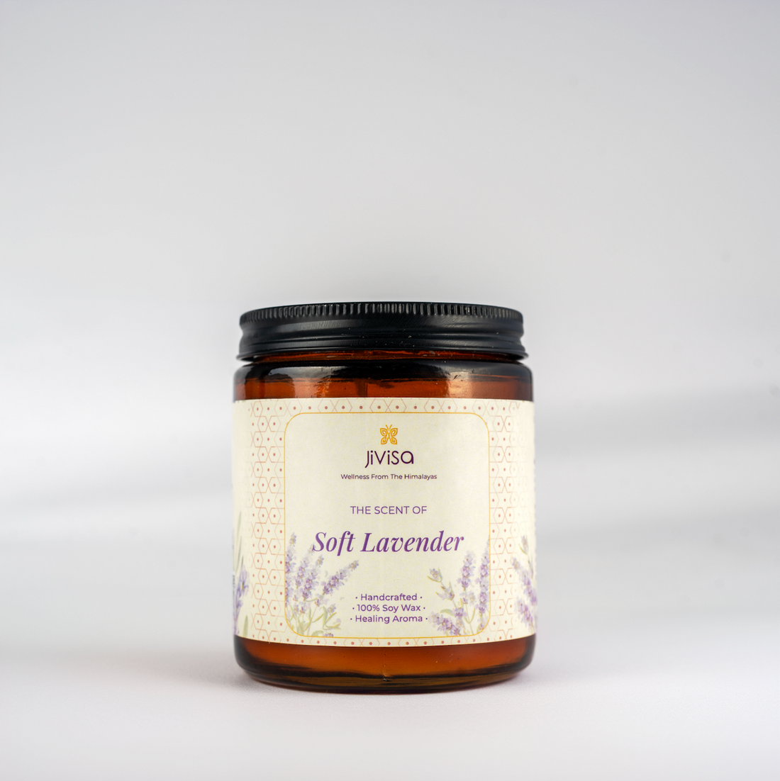 JiViSa Soft Lavender Handcrafted Soy Wax Candle 180gm in an amber glass jar with a Black tin and white label.  The label reads: &quot;JiViSa Wellness From The Himalayas, THE SCENT OF Soft Lavender, Handcrafted 100% Soy Wax Candle, Healing Aroma&quot;.