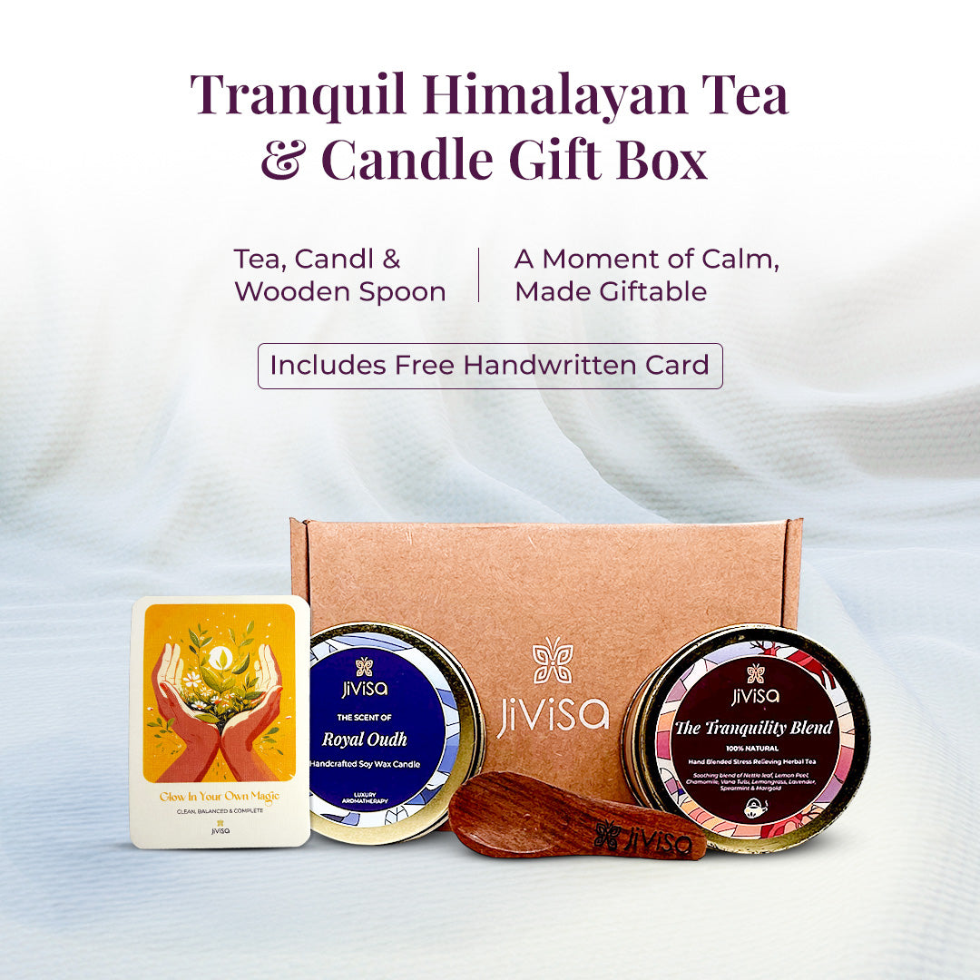 Tagline reads: &quot;Tranquil Himalayan Tea &amp; Candle Gift Box – Tea, Candle &amp; Wooden Spoon. A Moment of Calm, Made Giftable. Includes Free Handwritten Card&quot; followed by a soothing product arrangement featuring JiViSa’s kraft gift box, Royal Oudh soy wax candle, Tranquility Blend herbal tea, wooden measuring spoon, and a handwritten gift card, all designed to offer a complete calming ritual in one elegant set.