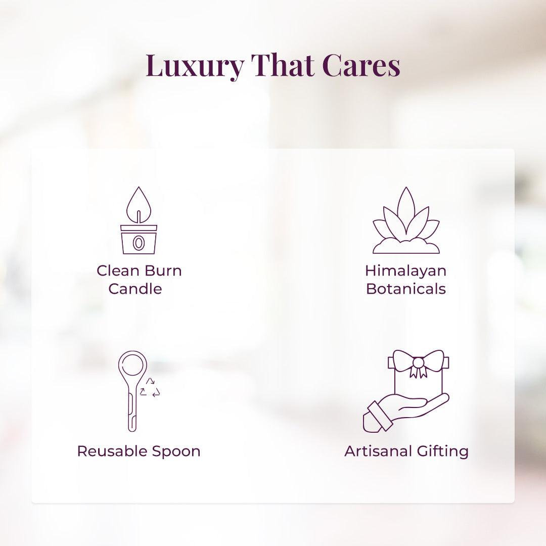 Tagline reads: &quot;Luxury That Cares&quot; followed by a minimal infographic with four purple icons representing JiViSa’s thoughtful craftsmanship: an icon of a candle flame represents Clean Burn Candle, a lotus flower over hills represents Himalayan Botanicals, a spoon with arrows represents Reusable Spoon, and a hand holding a gift box symbolizes Artisanal Gifting.