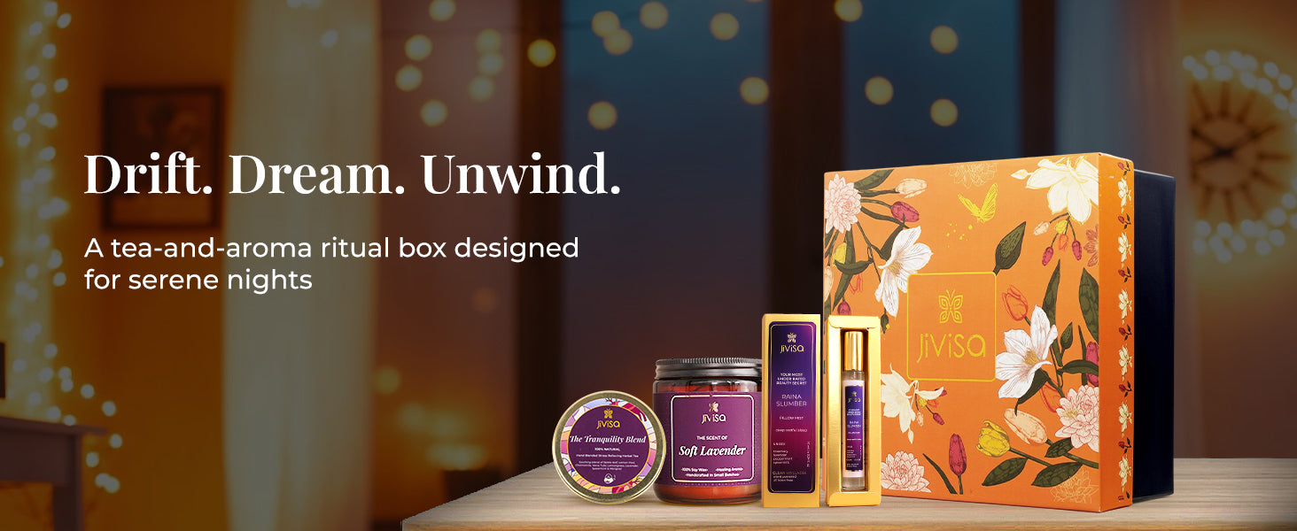 Floral orange JiViSa Twilight Calm Tea & Aroma gift box displayed with its products in a festive background — JiViSa Tranquility Blend herbal tea, JiViSa Soft Lavender candle, and JiViSa Raina Slumber mist. The tagline reads: ‘Drift. Dream. Unwind.’ Below, the text says: ‘A tea-and-aroma ritual box designed for serene nights.’