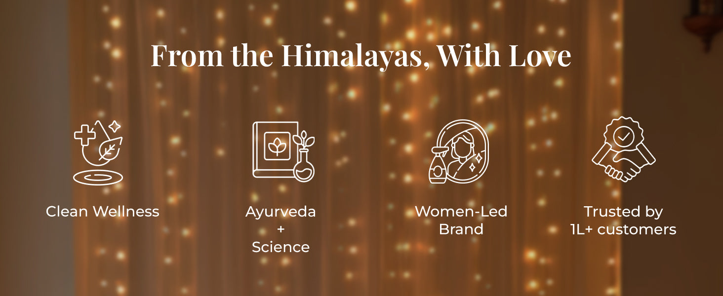 Tagline reads: "From the Himalayas, With Love" and four icons: a leaf with sparkles labeled 'Clean Wellness,' a book and flask labeled 'Ayurveda + Science,' a woman with bottles labeled 'Women-Led Brand,' and a handshake with badge labeled 'Trusted by 1L+ customers.'