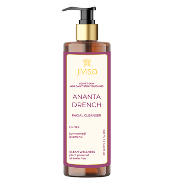 Front view of JiViSa's Ananta Drench Facial Cleanser, 100ml bottle, featuring a cream label with a purple border, the product name, and the tagline 'Velvet Skin You Can't Stop Touching', highlighting key ingredients like kumkumadi and jatamansi.