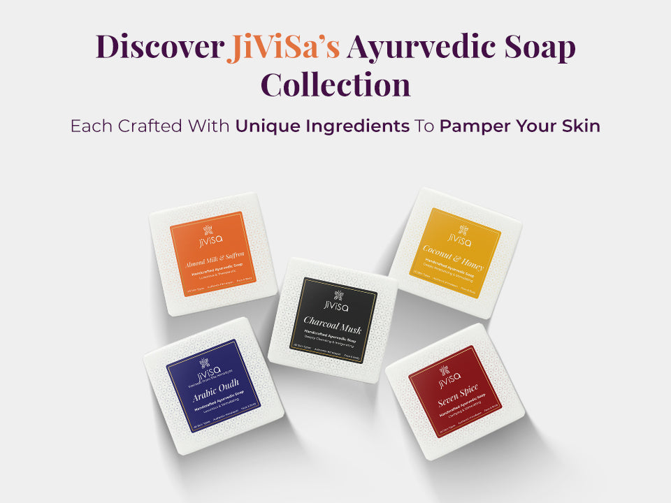 A flat lay image features five different JiViSa handmade ayurvedic soap variants: Almond Milk & Saffron, Arabic Oudh, Seven Spice, Charcoal Musk, and Coconut & Honey. The left side contains text reading “Discover JiViSa’s Ayurvedic Soap Collection” and “Each Crafted With Unique Ingredients To Pamper Your Skin.” The visual highlights product variety and ingredient-based formulation.
