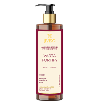 The front view of JiViSa's Varta Fortify Hair Cleanser. The product promises to "Make Your Strands Strong Like You" and is designed for both men and women. Key ingredients include bhringraj, manjistha, and amla. The product is labeled as "Clean Wellness", "Plant Powered", and "All Toxin Free".